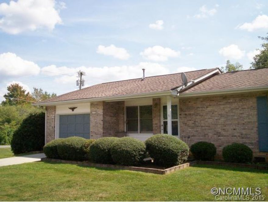 Convenient to town in desirable Deer Track subdivision is this two bedroom, two bath home with an open floor plan and spacious sunroom.  Light, bright, and waiting for your updates.  A wonderful house for someone wishing to downsize while still having the bonus of a sunroom and a large kitchen and bedrooms.