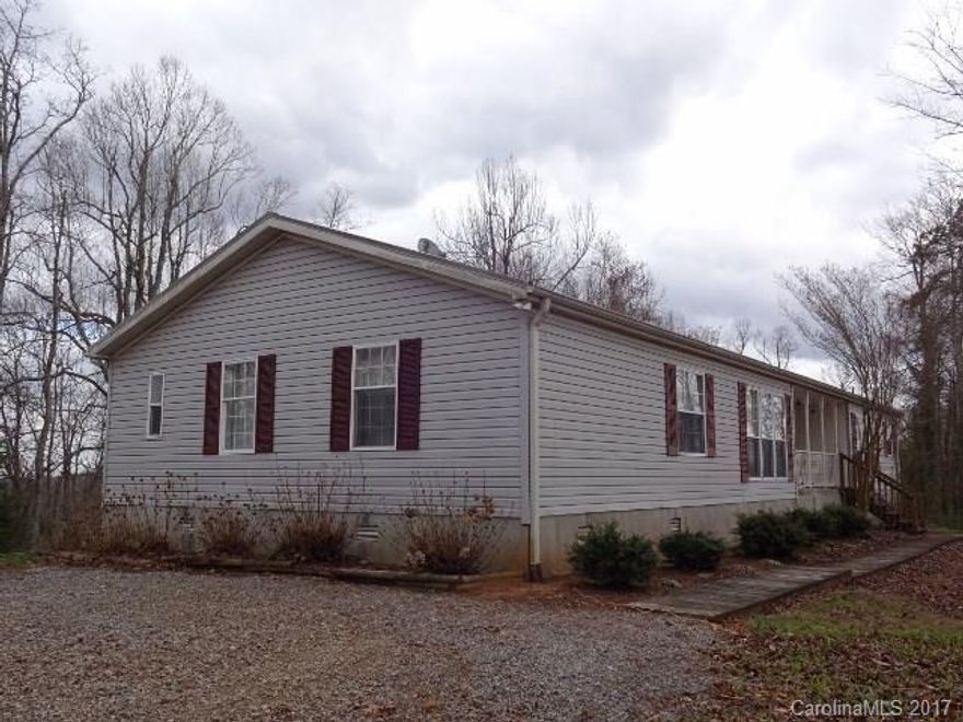 SPACIOUS HOME W/OPEN SPLIT BEDROOM PLAN.  WINTER VIEWS FROM FRONT AND BACK.  PRIVATE, TUCKED AWAY LOCATION W/CONVENIENCE TO I-26 & HENDERSONVILLE!