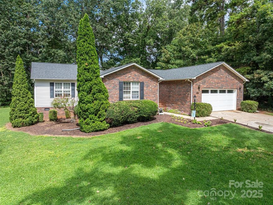 This home is located just outside of Lincolnton; however, close for all of your necessities. The outside of the home feels like you are in a small community. As you enter the inside, you will find a living room with gas log fireplace and to the right is the kitchen with a breakfast area. Around the corner is formal dining room. Home has a primary suite that is tucked away from the other bedrooms. Septic Permit is for a 3 bedroom but there is 4 bedrooms and an office space. The bedrooms have 3 conveniently located full bathrooms. From the living room, you can exit the home onto a large deck which looks onto a very private feeling back yard. Lots of relaxation space here. There is a short commute to Denver, Hwy 16 or Hwy 321. There is a separate membership required to use the community pool. The hall bathroom has a toilet that was leaking. The leak has been fixed and new flooring installed. There are 3 photos that have been virtually renovated. Living room photo has painted walls, and new furniture. Primary Bedroom has painted walls, new flooring, new light fixture, and new furniture. Kitchen has been virtually renovated to give the cabinets new color.