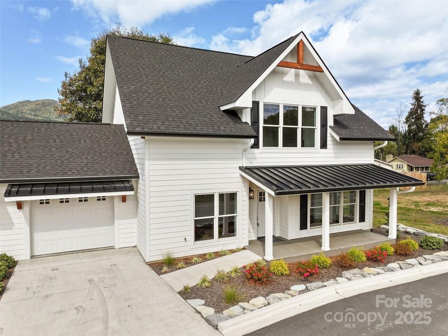 Welcome Home to Style, Comfort, and Location! This stunning custom-built townhome offers the perfect blend of craftsmanship, modern design, and mountain-town convenience. Featuring three spacious bedroom suites, each with its own full bath and walk-in closet, plus an additional half bath for guests, this residence delivers both luxury and livability.

Quality and detail shine throughout, from Andersen windows and durable concrete siding to granite countertops, custom flooring, and high-end LG appliances. Enjoy the comfort of natural gas, tankless hot water, and a single-car garage for added ease. Every full bath is thoughtfully designed with double vanities, creating the feel of a private retreat in every suite.

Just steps (or a short five-iron) from the Waynesville Inn & Golf Club, this home offers unbeatable proximity to downtown Waynesville’s shops, restaurants, and vibrant Main Street. Whether you’re looking for a primary home, vacation getaway, or income-producing rental, this property is it.

Only 30 minutes to Asheville and 20 minutes to the Blue Ridge Parkway and Great Smoky Mountains National Park, this townhome captures the very best of mountain living, modern comfort in a prime location.