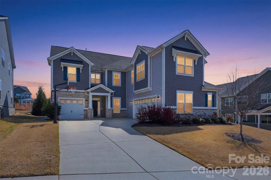 This incredible home has it all! Featuring 5 bedrooms, 4 full baths, and a 3-car garage, this beautifully upgraded home offers over 4,000 sq ft of elegant living space and an amazing backyard retreat. The gourmet kitchen features exquisite quartz countertops, gas cooktop with vented hood, upgraded modern lighting, and a large walk-in pantry with custom shelving. Elegant 44" board and batten wainscoting enhances the two-story foyer, formal dining room, and loft.

The functional floor plan includes a main-level bedroom and full bath, ideal for guests. Upstairs offers a spacious loft, huge bonus room, and an impressive primary suite with dual quartz vanities, soaking tub, separate shower with bench, and a massive walk-in closet with custom shelving. A charming custom pet nook under the stairs adds character and convenience.

Enjoy the private outdoor oasis featuring a screened porch and saltwater pool with sun shelf, jumping rock, waterfall feature, and hot tub. A stone paver walkway leads to the fenced backyard, enhanced with privacy tree landscaping and an in-ground basketball goal.

The 3-car garage includes epoxy flooring, custom storage racks, and a Tesla wall charger. This home combines luxury upgrades with resort-style outdoor living. Must see!

The community will also benefit from the upcoming construction of Jim Ramseur park, which will connect directly to the neighborhood adding even more green space, recreation and outdoor enjoyment just moments from your doorstep.