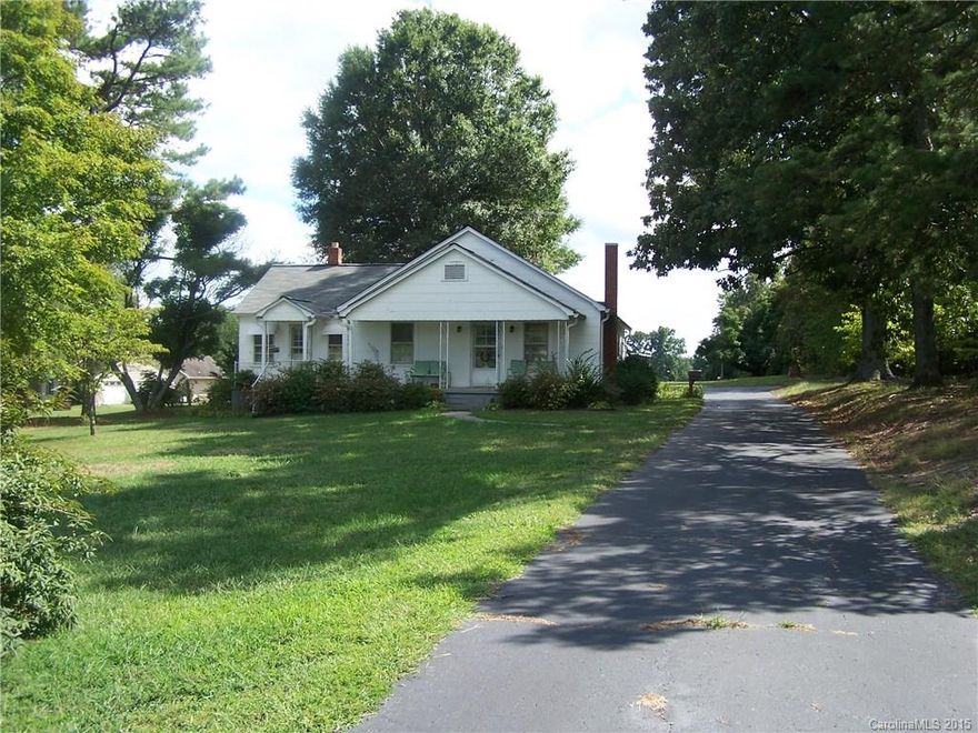 Almost 16 acres of beautiful land.  Approximately 1/2 is cleared and 1/2 is wooded.  Land lays well.  Home is being sold AS IS.  Nice agricultural community in the southeastern part of Iredell County.  Home has a 2" well.  Property includes the following:  Deed Book 194 P30; B351 P93; B728 P122; B767 P 964 - which adds up to 15.98 acres.  Tax card shows 15.68 acres.