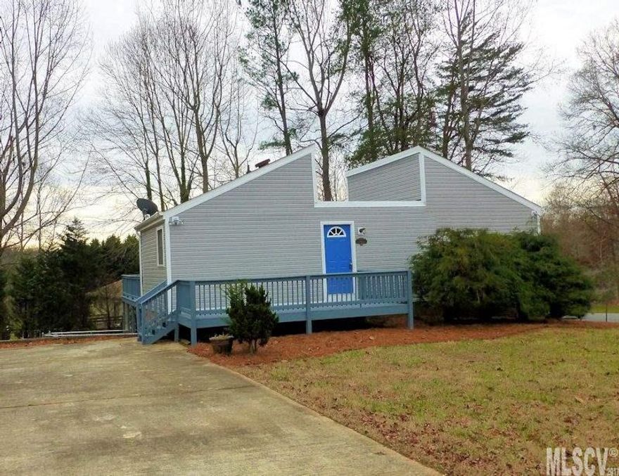 Adorable 2 bedroom, 2 full bath home (ranch w/basement) on a corner lot in a NE Hickory location. Well maintained & move-in ready! Decks galore with recent fresh paint....approx. 775 sqft of decking. Great room has gas log FP(no propane tank on property...buyer would need to get a tank for use of logs), built-in cabinets, laminate floors, & access to a deck. Nice kitchen offers a refrigerator, dishwasher, & electric range, pantry, and has a wall opening to view the great room. Laundry closet (no doors) on main level. Both bedrooms are good sized and each have their own full baths. The lower level/basement is unfinished with some HVAC vents...painted concrete floors....could be easily finished...great for storage. Public water and septic tank. Updates in 2016-- vinyl siding installed, decks stained, updated baths, laminate flooring & BR carpet installed, & fresh paint. Fully fenced area on lot (dog lot). 2016 taxes were: $772.84. 2 driveways on property. CUTE AS A BUTTON! CALL TODAY!