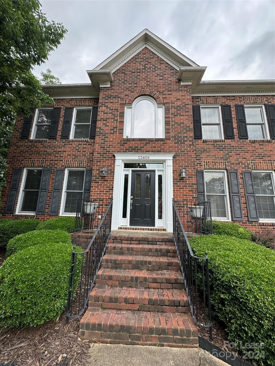 This beautiful home boasts a dramatic 2 story foyer w/hardwood floors that extend thru the breakfast area, kitchen & powder room. Beautiful updated kitchen, center island & large pantry. Huge owners retreat w/room sized walk in closet, sitting area, whirlpool tub, separate shower & dual vanities. 3 large secondary bedrooms & a large rec room. Large wooden deck overlooking very nice wooded lot!