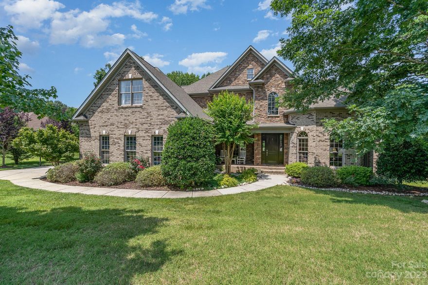 Beautiful, well-maintained, custom cul-de-sac home sitting on 1.46 acres in the highly desirable Carolina Coves neighborhood. The home boasts a thoughtful and spacious design that perfectly combines elegance and functionality. The grand entrance is flooded with natural light. The first-floor Primary Bedroom offers a sizable ensuite with 2 walk-in closets. Enjoy the spacious 2-story great room with fireplace, beautiful hardwoods, an open kitchen with granite countertops and gas range, breakfast area. Upstairs has a spacious bonus room & 3 large bedrooms, one that includes its own private bathroom. You will find a ton of storage throughout the home. Spacious side load 3-car garage. The finished basement is a flexible area that can be tailored to suit your specific needs, whether it's a home theater, a gym, or a recreation room. The landscape provides ample space for outdoor activities, from hosting gatherings to simply enjoying the natural scenery. Low HOA. Award-winning Clover schools!