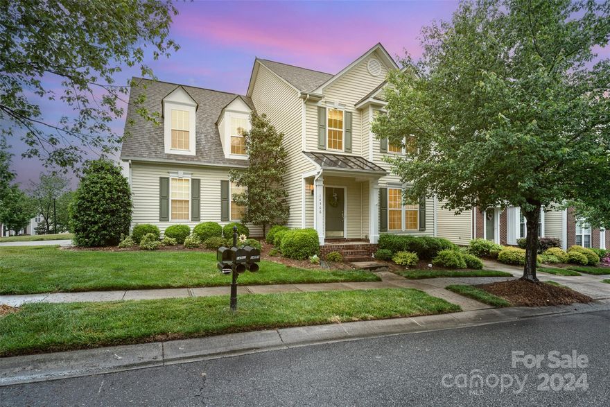 Step into luxury living at this stunning end unit townhome in the vibrant golf course community-Skybrook. This gem features a private two-car garage & a welcoming private drive, evoking the feel of a spacious single-family home. Inside, gleaming hardwood floors grace the main level, creating an atmosphere of elegance & comfort. The large living room flows into the updated kitchen, showcasing quartz countertops, a stylish island w seating, a beautiful tile backsplash & sleek stainless appliances. The kitchen includes a built-in wine/coffee bar & a spacious pantry. The expansive family room boasts vaulted ceilings & a cozy gas fireplace w French doors to the patio—perfect for entertaining. Upstairs, retreat to the Primary bedroom featuring dual walk-in closets, dual vanities w quartz countertops, a luxurious soaking tub & separate tiled shower—an ideal sanctuary. Don't miss the opportunity to own this bright & sunny townhome—a blend of style, convenience, and luxury living awaits!