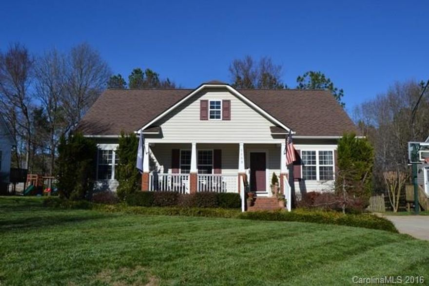 Cute ranch with a rocking chair front porch and beautifully lanscaped yard.  Tons of living space and additional bonus room upstairs! Open layout, vaulted ceilings, and arched entries.  Just adorable!