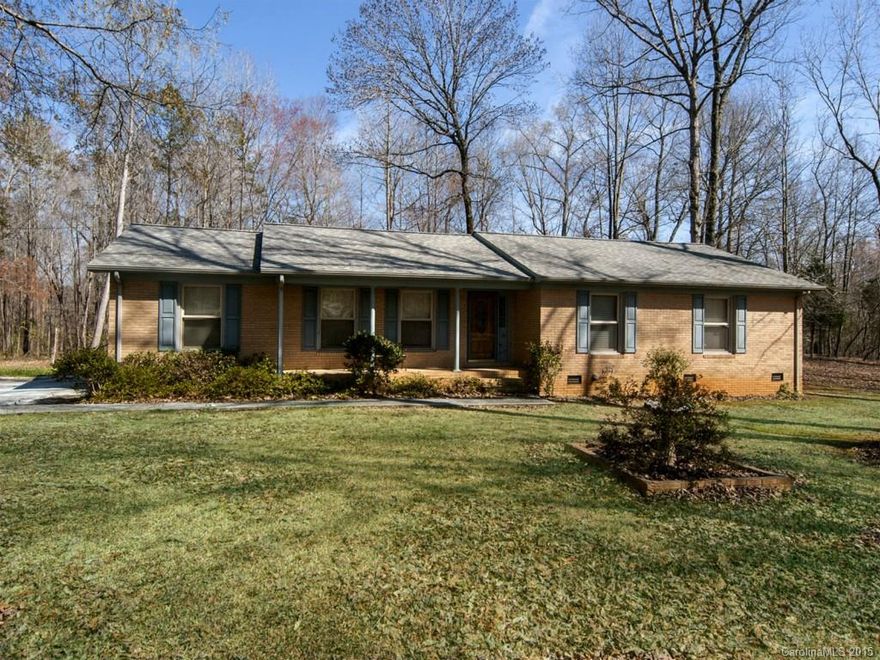 This is the Buford home you have been waiting for.  Priced to move quick.  Home is ready to move in.  Hardwood flooring, updated kitchen and all appliances stay.  Enjoy the private back yard from the large screen porch.  Detached 3 car garage is perfect to hold everything.  Call before you miss out on this wonderful home.