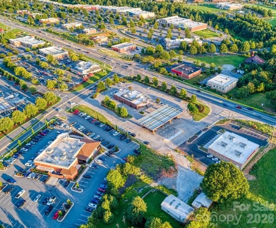 Prime commercial opportunity on River Highway (NC Hwy 150) in the rapidly growing Mooresville corridor near Lake Norman. 690 River Hwy offers exceptional visibility and accessibility along one of the area’s primary east-west thoroughfares connecting Mooresville to Denver and surrounding Lake Norman communities.

The property is positioned in a high-growth commercial corridor surrounded by established retail, medical, and residential development. With strong daily traffic counts and convenient access to major routes including I-77, the site provides excellent exposure for businesses seeking visibility and accessibility.

Ideal for owner-users, investors, or developers looking to capitalize on the continued expansion of the Lake Norman market. The location offers strong potential for a variety of commercial uses including retail, office, medical, or service-oriented businesses.

Conveniently located minutes from Lake Norman Regional Medical Center, national retailers, restaurants, and major residential communities, placing your business in the center of one of the region’s most active growth corridors.

Buyer to verify zoning, utilities, and permitted uses.
