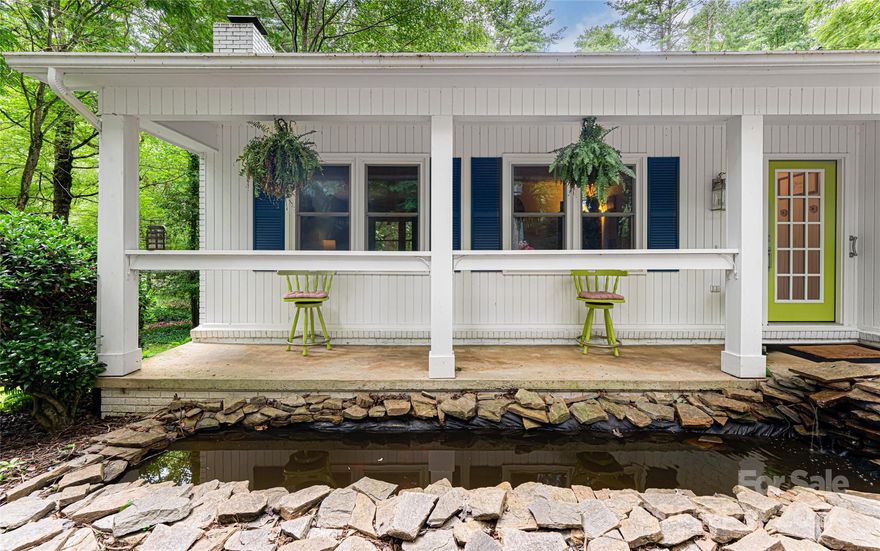 This charming cottage sits on almost an acre and is located just a few minutes from downtown Hendersonville. Natural light floods almost every room in this charismatic home. The main level offers a desirable floorpan with three bedrooms and two bathrooms and the basement includes additional bonus rooms with limitless possibilities. The screened porch sits right off the kitchen and looks out over the expansive and serene lot. The charming kitchen and dining area open to a large living room that looks out over a covered porch and a koi pond in the front yard. The large two car garage sits on the basement level and allows easy access to the bonus rooms in the basement. Don't miss this sweet home - it has everything you need! There is an additional 781 square feet of livable "finished" area in the basement as seen in the photos; this space cannot be included in HLA due to unfinished ceilings.