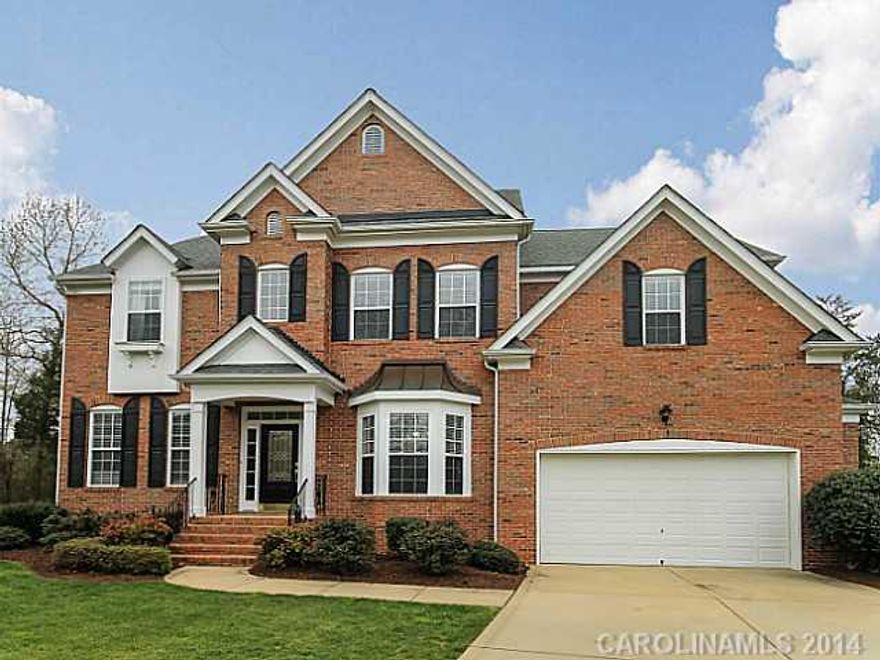 Amazing home. Formal Dining, Living & Office w/ hardwoods. HUGE Kitchen w/ center island, Corian counters, pantry, ample counter/cabinet space & breakfast area. Great flow from kitchen to 2 story family rm w/ built ins & fireplace. 1st Flr Guest Suite. Spacious Master Suite w/ large WIC. BDRMs w/ private baths on 2nd flr. 2 Huge BNS Rms- 1 can be 5th BDRM.   2 Car Garage & Deck! 1 yr Home Warranty
