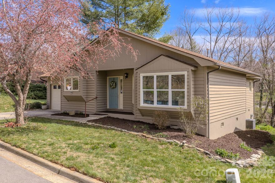 Enjoy easy, low-maintenance living in Hawthorne Villages, which is tucked into a quiet pocket of Haw Creek just minutes from downtown Asheville. This home offers a level driveway and minimal steps for easy daily access. Inside, the well-designed layout includes a formal dining area, inviting kitchen with gas stove & a generous primary suite with two walk-in closets. Bathrooms have been thoughtfully updated with modern finishes. Relax on the screened porch overlooking a small stream and enjoy the peaceful, private setting. Residents love the friendly, established community, along with access to a clubhouse and outdoor pool, all in a location that feels safe and welcoming. Conveniently located only .6 miles to Rendezvous, a beautiful French restaurant in Haw Creek, the local library, Whole Foods and much more. Monthly HOA fee includes city water, sewer, trash, recycling, lawn and community maintenance.