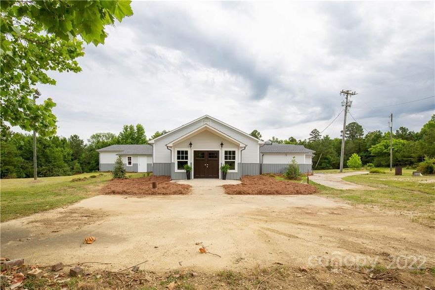 Amazing opportunity to start your own venue, church or have a meeting space with lots of land to expand. 5 acres of beautiful land with unlimited possibilities. Building has undergone major renovations including new roof, new HVC. Kitchen equipment remains which includes large walk in cooler, oven, commercial sinks and another cooler. Additional parcel located next to the venue is on 5.42 acres, for a total of 11.42 acres.