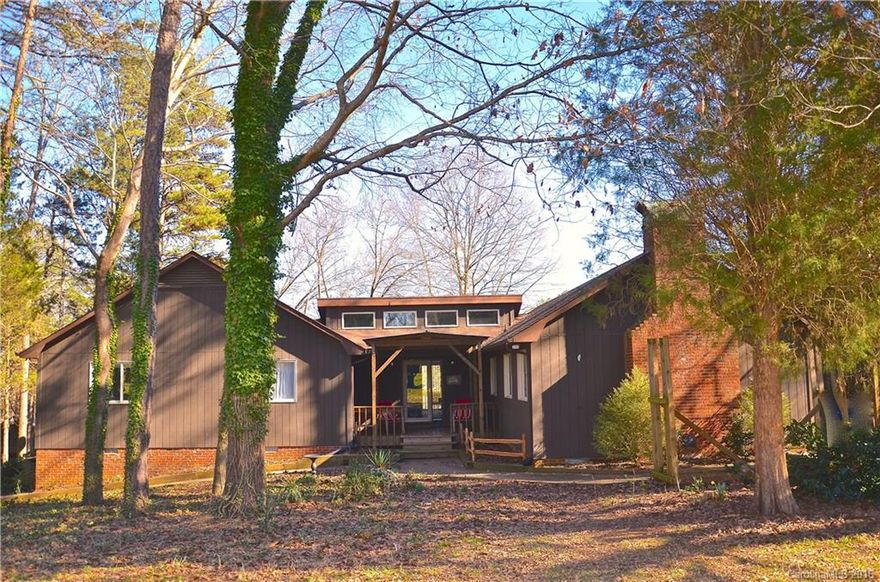 Reduced! Bring buyers back!New flooring in basement! New Porch! Beautiful rustic home on 3.63 acres. 2 min.from everything! NOT in city limits.Home boasts of natural light.Freshly painted Living rm dining rm & kit. Living rm has new carpet w/vaulted ceiling sky-lights & glass doors that lead to porch. Lrge. kit w/island built in shelving & 2 pantries for added storage Nice size bedrooms.Basement bonus/Bdrm w/full bath. 2 car attached & 2+car detached garage shop insulated w/stove & wired 220.