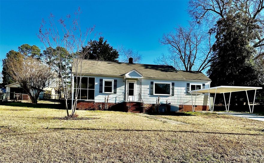 Adorable home on a great street just 2 miles from the white water center! Great Falls is located halfway between Charlotte and Columbia right off I77 and makes it a great location for commuters to either city. This home has been updated with refinished hardwood floors and fresh paint last year. Water heater was replaced last year. The roof and HVAC were replaced in 2016. It has vinyl replacement windows and a free standing gas fireplace. It is move in ready with a cozy screened porch and a fenced in backyard. It has a detached carport on the front with a paved drive and a storage/garage in the back. It is very clean and well cared for! It would also make a great investment or rental property for all of the outdoor amenities in the area- whitewater center, Carolina adventure world, Gallo winery, Carolina thread hiking trail and Skydive Carolina just to name a few!