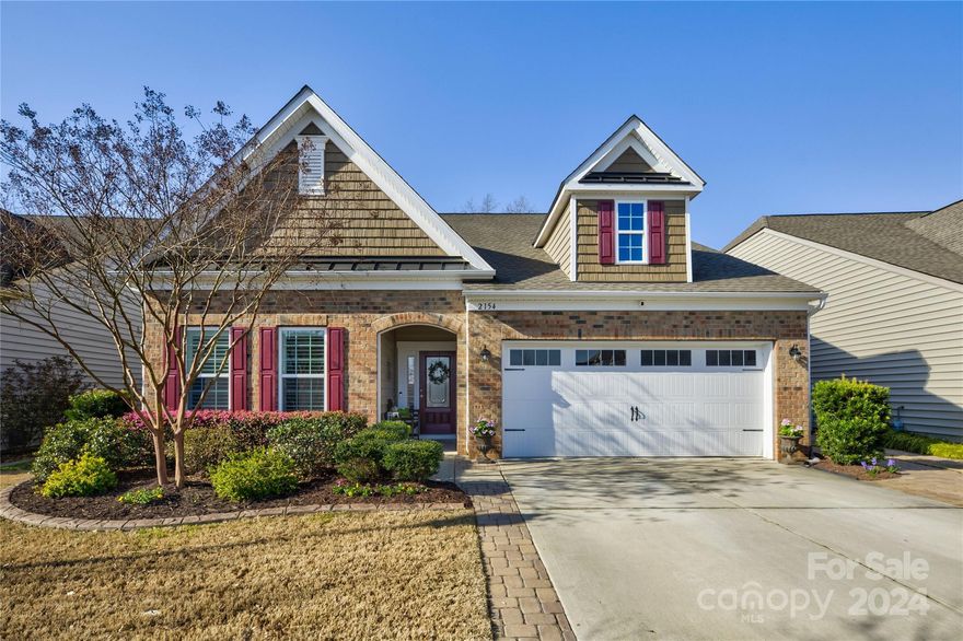 Welcome to this stunning home located in the heart of Fort Mill, where comfort, convenience, and luxury come together. Key features include, a Gourmet kitchen with a 12 ft island. Granite countertops with stainless steel appliances for a sleek modern look. Walk-in pantry for ample storage space. Beautiful breakfast area overlooking a private backyard oasis. spacious owner's suite on the main level with a sitting area. Access to your own Four seasons porch. Backyard features a hot tub, complete with a hot/cold system for year round use. Fully fenced backyard with tile walkways to the front of the house. Oversized guest suite with a huge recreational area, and bathroom for a complete privacy of your guest. Amazing neighborhood amenity package. Situated just minutes away from perfect dining options, this home offers the best of both worlds - a peaceful retreat in a prime location.