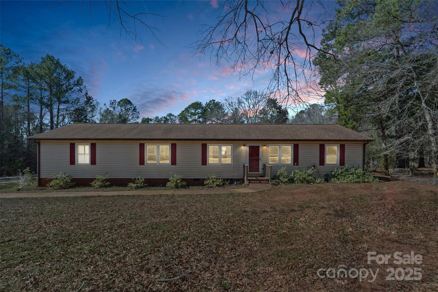 Welcome to this beautiful home nestled on 2 peaceful acres, offering both comfort and privacy. With plenty of recent updates, including brand-new flooring, stunning cabinets, and elegant granite countertops, this home blends modern luxury with timeless charm. The spacious layout features 4 spacious bedrooms and 3 generously-sized bathrooms, perfect for families and guests. Enjoy cozy evenings by the fireplace or unwind in the tranquil surroundings of this quiet retreat. This property is an ideal blend of space, style, and serenity. Don't miss your chance to make this dream home yours!