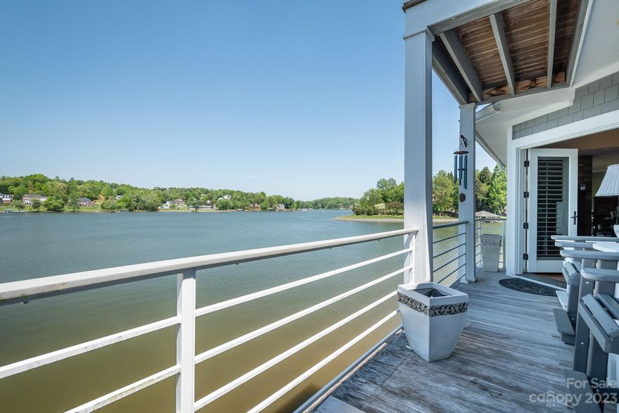 Indulge in waterfront paradise.This captivating home offers the rare combination of a serene lakeside setting and the convenience of a deeded boatslip, ensuring endless aquatic adventures. Immerse yourself in the breathtaking views visible from the spacious interiors. The modern kitchen, cozy bedrooms, and inviting living areas provide comfort, while the private deck becomes a gateway to nature's beauty. With direct lake access and located in the heart of Hickory, this residence harmonizes relaxation and recreation.  Imagine waking up to stunning views of the lake from the comfort of your primary suite. The en-suite bathroom offers a spa-like experience, creating the perfect space to unwind after a day on the water.  The heart of the home revolves around a gourmet kitchen, complete with modern appliances, granite countertops, and a copper-top center island. A/C replaced 2023.  Dishwasher replaced 2023.