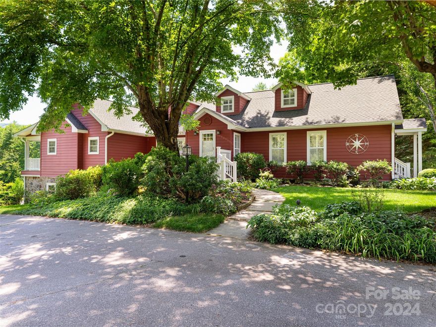 Homesteading Opportunity in Hendersonville, where nature dictates the pace for a more natural and self-sustaining lifestyle! Charming & Spacious Farmhouse loaded with personality was designed for and is perfectly suited for horses (or other livestock) and garden lovers. The outdoor living areas, decks and wraparound porches seamlessly blend the outdoors in, creating a haven for living well, entertaining and offering a possible rental or separate guest quarters. This 7 acre homesite encompasses the pond, bridges, 2 fenced pastures, 3 stall horse barn with tack room, an equipment barn with seasonal upstairs apartment, fenced raised garden beds & shed, and a chicken coupe/dog run. Canning kitchen in the lower level has indoor/outdoor access, and could easily be converted to separate living space. Sellers own adjoining 23 acres with riding and hiking trails, that could also be for sale. Close to Historic Downtown Hendersonville; Brevard and a 45 min. ride to Tryon Equestrian Center.
