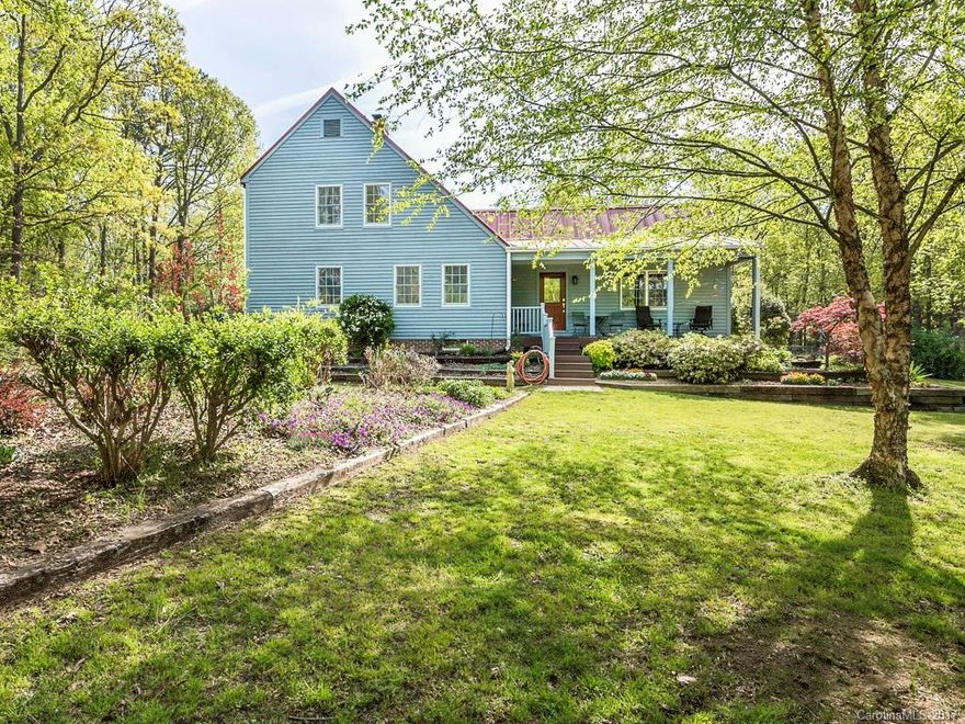 Unique New England Salt box home on 110 private acres of hardwoods & pasture. Siding is rough sawn cedar. 
Home has NC Maple oil finished tongue & grooved floors, solid cherry cabinets, Scandinavian Tulikivi soapstone fp/stove. Stair handrails are hand planed solid walnut. Home has Williamsburg colors & simulated whitewash walls. Deck & porch are "Trex" composite. Raised beds for gardening. This property is perfect for "bird, horses & livestock" lovers. The "country life" close to Charlotte.