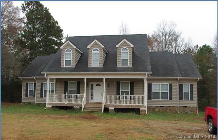 This large newer modular sits on 3 private, secluded acres! Main floor Master has 2 Closets & private Bath with Garden Tub & Separate Shower. You'll find 2 additional Bedrooms on the main floor, a Great Room & a large Kitchen/Dining Room combination.  The main floor Laundry Room is complete w/a handy Utility Sink.  Two more sizeable Bedrooms, another Full Bath & huge Bonus area up, along with ample attic storage.  There is lots of room to spread out in this one! Eligible for USDA financing.