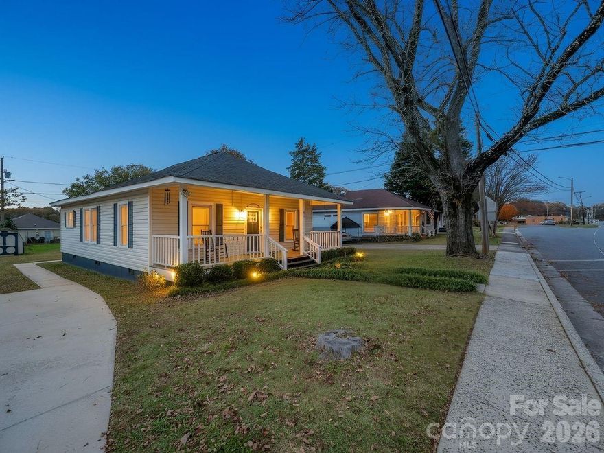 Bright, Beautiful, Belmont-Area Bungalow Boasting Breathtaking, Boundless Benefits!  

Welcome home to this charming one-level cottage-style bungalow, offering fresh updates, effortless livability, and the kind of front-porch charm that never goes out of style. Featuring 3 bedrooms and 1.5 baths—including a convenient ensuite half bath—this move-in-ready home blends modern comfort with timeless character.

Step inside to find neutral colors throughout, beautiful laminate flooring, and a bright, inviting layout. The light-colored kitchen shines with upgraded granite countertops, stainless steel appliances, a gorgeous tile backsplash, and the refrigerator stays—a nice bonus. The full bath features attractive tile in the shower and includes an adjoining laundry area for easy everyday living.

Enjoy peaceful mornings and breezy evenings on the full, covered front porch, perfect for rocking chairs and neighbor-watching. Out back, a private deck overlooks a flat, usable backyard, complete with a storage building for all your extras. Easy-maintenance vinyl siding means more time relaxing and less time working.

Location brings the whole package together: you're just steps away from local favorites like Chicken King and The Thirsty Social Club, with sidewalk access right from the house for strolls around the community. Commuters will love the quick access to I-85, Belmont Abbey College, and being only 15 minutes to Charlotte Douglas International Airport.

Ceiling fans in every room, updates throughout, and true move-in readiness—this one is the perfect blend of convenience, charm, and comfort. Come see it today; homes like this don’t sit still for long!

“The best investment on Earth is earth.” — Louis Glickman