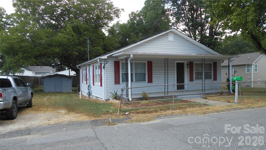 Seller is listing agent. Partial basement is like a root cellar with a partial concrete floor with a sump pump in case water comes in. House was treated for termites due to scraps of wood in the crawl space that had evidence of termites, although the wood structure did not. House was reroofed in 2025 with 30 year architectural shingles & new plywood was installed over the wood slats since there was none & to try to eliminate any possible future issues with the roof decking. All ceilings were repainted & the interior paint redone where needed. Carpet was professionally cleaned. The refrigerator was replaced 3 years ago & the motor on the HVAC unit replaced in 2022.
Roof on the cinder block utility building will need replacing & will be with a full offer.