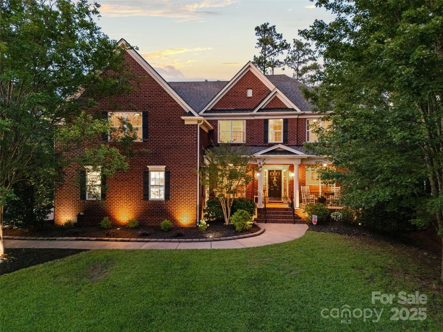 Perfect yard for a pool! This spacious 5-bed/3 full bath, beautifully maintained, one-owner home is located on a quiet cul-de-sac--all on the highly desired peninsula of Tega Cay! This stately full brick home offers a thoughtfully designed main living space with an inviting kitchen, perfect for family dinners or hosting guests. It features gleaming granite countertops, center island, a gorgeous custom pantry, & stainless steel appliances; all of which flow seamlessly into both the family room area & sunroom. With over 3700 square feet, this home is ideal for families of all sizes or anyone looking for flexible space to work, host, & relax. The main floor includes a versatile guest suite or home office & a full bath. Upstairs, you'll find the spacious primary bedroom suite, along with 3 additional bedrooms & a perfect flex space or bonus/game room, pre-plumbed for a wet bar. Plush, newer carpeting throughout the second-floor bedrooms and the upstairs laundry room offers maximum convenience. The desirable oversized 3-car garage provides ample space for parking, projects, or storage, and the yard features full irrigation. Enjoy your morning coffee or beautiful Carolina evenings with a glass of wine on the porch in the private rear yard, overlooking the walking trail. There's no shortage of storage space in this incredible home and the backyard shed will remain for additional storage options. Enjoy the fabulous Tega Cay lifestyle with no HOA, Tega Cay parks & playgrounds, scenic walking trails, public golf course, Tennis and Swim Club, easy access to Lake Wylie, and all of the fun community events that make Tega Cay a place residents love to call home!