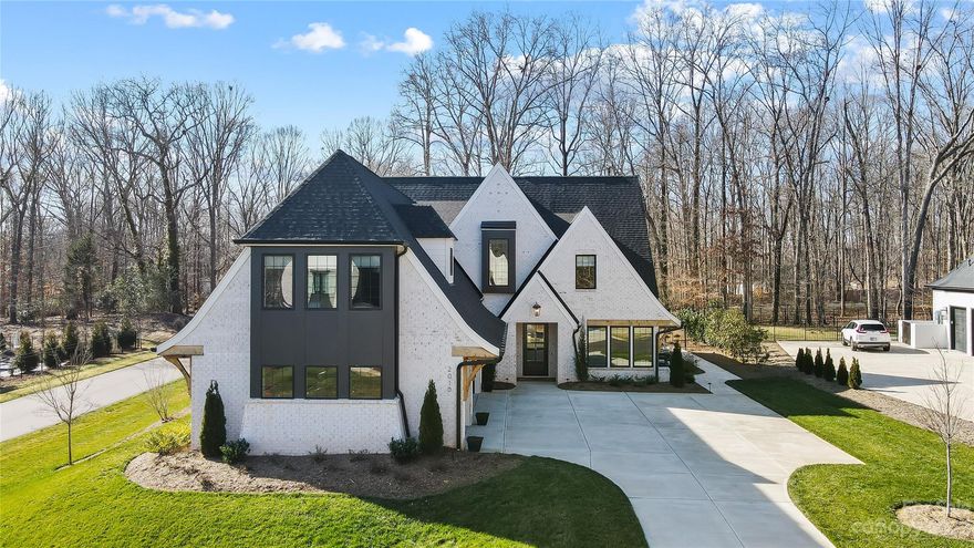 No details missed in this absolute head turning Linnane Homes custom built property completed in August 2022! Incredible outdoor entertainment area w/heated saltwater POOL & Spa, outdoor built in grill & surrounded by gorgeous Travertine decking! Premium cul-de-sac lot backing to tree save conservation area. Wide open 4 Bed, 4.5 Bath floor plan w/oversized Owners Suite & Office on the main, large Bonus & Loft on the 2nd level. Stunning details include custom soft close cabinets, commercial grade appliances, 42 inch built in Sub Zero
refrigerator, Wolfe gas cooktop, custom wood flooring, extensive trim detail, custom built-ins,
high end Quartz counters & gorgeous screen porch w/outdoor fireplace, radiant porch heaters & remote power screen! 10 ft ceilings & 8 ft solid core doors on the main, built-in mud lockers, 12 zone irrigation system, built-in speakers. Energy Star certified home. TOP RATED SCHOOLS. ONE OF A KIND PROPERTY! WILL NOT LAST! HURRY! EXPECTING MULTIPLE OFFERS!!