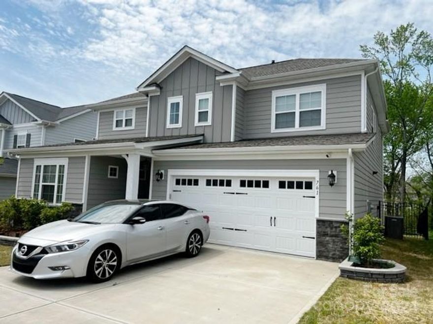 Welcome to your dream home! This stunning property boasts modern luxury and spacious living. As you step into this charming abode, you're greeted by an open floor plan adorned with gleaming hardwood floors that seamlessly connect each living space. The heart of the home is the state-of-the-art kitchen, featuring sleek cabinetry, a gas range, and a convenient kitchen island.

With five bedrooms and three full baths, there's ample space for everyone to spread out and relax. The main level offers a private retreat with a bedroom and full bath, while upstairs you'll find four additional cozy bedrooms, each adorned with plush carpeting for added comfort. The living room is a focal point of elegance, boasting a beautiful stone accent wall that adds both texture and warmth to the space.

Property just had new paint, and minor updates.

Community includes neighborhood park and pool