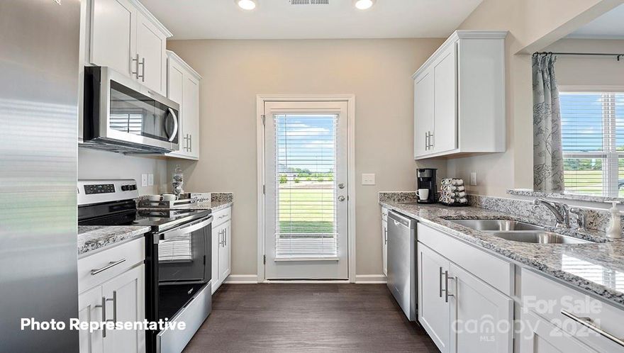 This HOME is under construction-The Newton is a spacious & modern home designed with open concept living in mind. This home features three bedrooms, two & a half bathrooms & a one-car garage. At the center of the home is a spacious living room that blends the dining area & kitchen creating an inclusive atmosphere. The kitchen is well equipped with a pantry, modern appliances, ample cabinet storage, providing a elegant space for culinary endeavors. The primary suite offers a large walk-in closet & en-suite bathroom with dual vanities. The additional two bedrooms provide comfort & privacy & share a full bathroom. The laundry room completes the second floor. Additional features are ample storage closets & large windows. With its thoughtful design, spacious layout, & modern conveniences, the Newton serves as home built for functionality and connectiveness. The Newton is the perfect home for you. REPRESENTATIVE PHOTOS