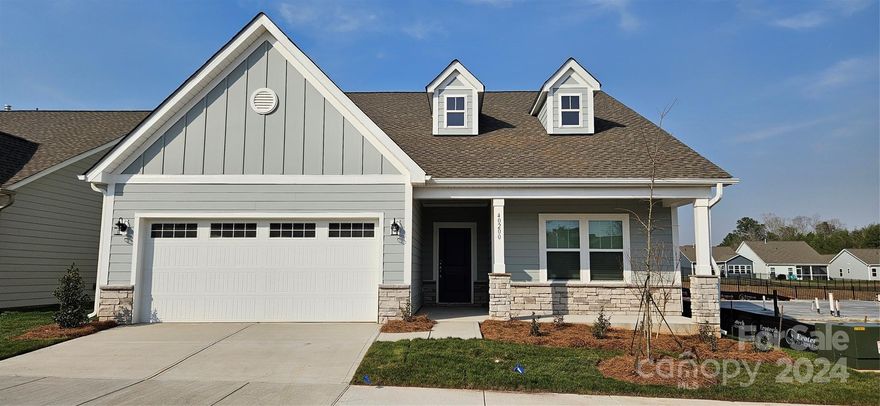 Montcrest plan, 1 story home with 2 car attached garage, gorgoeus front covered porch and a beautiful screened in porch. Located in the Cottages section of Edgewater lakeside and golf community. 3 bedrooms and 2.5 baths. This plan has a nice big sitting room off the primary bedroom.
It has a large island in the kitchen. Bump out the kitchen nook. This open floor plan is a must see!