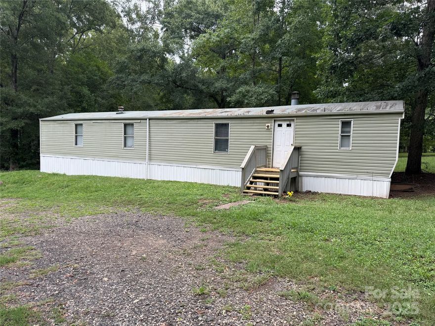 Welcome to your next opportunity in the growing city of York! This 2-bedroom, 2-bath mobile home is situated on a spacious 1.45-acre lot, the property provides plenty of room for outdoor living, gardening, or future expansion.
 The large lot gives you privacy while still being close to all the conveniences York has to offer—shopping, dining, schools, and quick access to Rock Hill, Lake Wylie, and Charlotte.
Whether you’re looking for a personal residence, a rental investment, or a property with land to grow into, this is an excellent value in a market that continues to see strong growth.