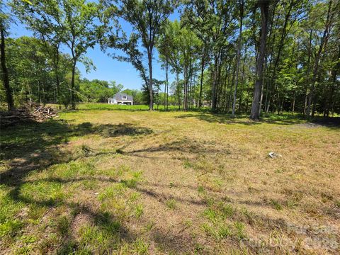 Photo of 8321 Rocky River Road, Harrisburg, NC 28075 (MLS # 4399843)