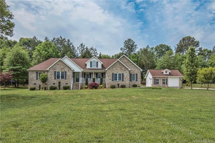 Beautiful ranch plan on over an acre with additional garage/workshop or gameroom. Home actually backs up to neighborhood common open space which provides the feel of being on several acres. The large dinning room connects to kitchen and is perfect for family or neighborhood gatherings. Add the detached shop/gameroom and you have the perfect house to enjoy with friends or have privacy to work on projects. Just a few minutes of 77. Easy to access but still has that country feel!