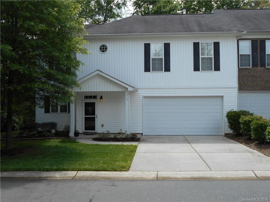 Beautiful end unit. This home features laminate wood flooring throughout both levels, bay window in breakfast area, built in desk and fireplace in the Great room, plantation shutters though-out, Master Suite on main level, two bedrooms up, one is large enough to use as a bonus room, as it has a 2nd fireplace and a wet bar, lots of closets and a screened porch overlooking a wooded backyard make this a very desirable home.