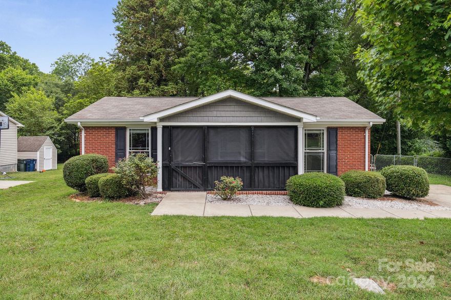 Grand location off of Catawba Avenue in Cornelius.  Walk to charming uptown Cornelius and experience great dining, shopping, and plenty of outdoor activities.  This home is clean and in move-in ready condition ready  for quick close.  No HOA! Braxton Heights is the subdivision name!
This two bedroom 1 bath home is cozy and charming and has been well maintained by present owner.    This home has living room, kitchen, dining area, laundry area and two bedrooms with shared spacious bathroom accomodating tub with shower.  Floors are laminate and kitchen floor has a newer laminate tile. New owner will love the screened in porch for quiet evenings and cool mornings! 
Photos and measurements will be attached to MLS this week.   Fenced in back yard with mature trees and there is a storage shed to stay. Ready for showings!   Call Showings for appointment(s). Refrigerator stays. Washer dryer does not.