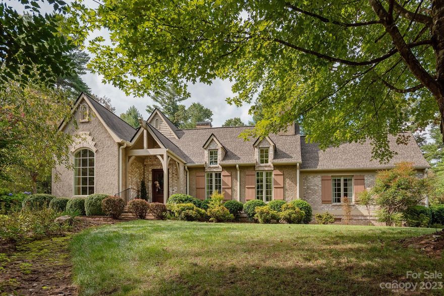 Beautiful French Country Estate Home, custom built with attention to every upscale detail.  The design has a gracious flow for everyday living. Meticulous grounds and lush landscaping would be any gardeners dream. Pebbledash and brick exterior, circular driveway with ample parking. Interior features include great room with beamed vaulted ceiling and fireplace, formal dining room, gourmet kitchen with gas cooktop and high end appliances, walk-in pantry, center island in kitchen and relaxing keeping room with fireplace. Gorgeous backyard  courtyard is barbecue ready and perfect for entertaining guests.  Primary bedroom boasts spa bathroom and large walk-in closet. Upper level has two guest bedrooms with walk-in closets and ensuite bathrooms. Separate adjoining lot included with acceptable offer. Selling agent to receive a $5000 (Five Thousand) sales bonus if offer is presented and accepted by December 8th 2023.