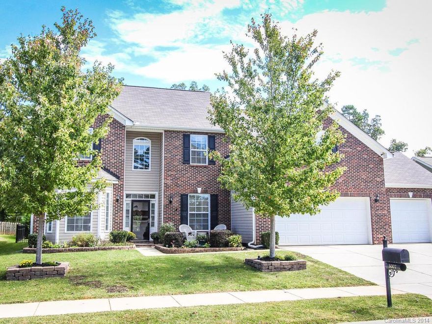 Awesome living space in and out....LR/DR/Great Room plus Sunroom leads to lovely outdoor living area with pergola, several seating areas, built in grill, play area, fruit trees, berry bushes, storage building and wrought iron fence.  Main Level includes large guest suite w/walk in closet & full bath.  Kitchen features island, granite counter tops, and custom back splash.  Hardwood floors thru out main level (except guest suite) Upper level w/4 bedrooms + bonus Rm. Bonus Rm w/closet can be 6th BR