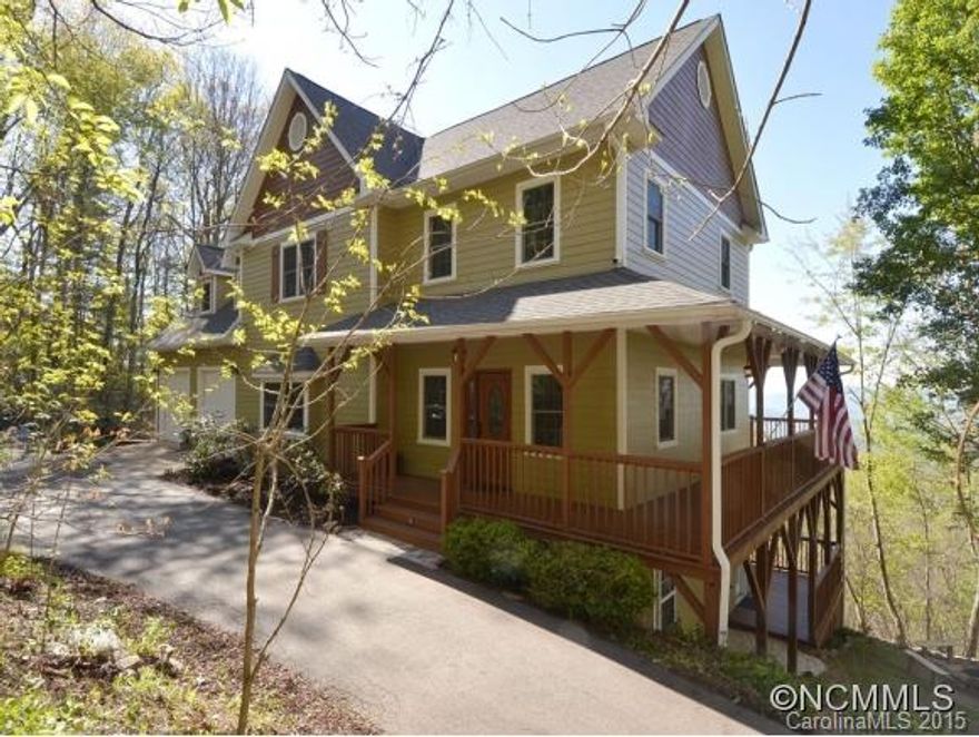 Recently renovated home in Town Mountain. A completely move in ready home with all new interior/exterior paint, gleaming hardwood floors and wrap around deck. Central vacuum system makes clean up a breeze. Entertain in the lower level with radiant heat flooring. New cabinets and appliances make the open kitchen a central gathering place. Step out to the deck and marvel at the extraordinary long range views. Special warranty deed to be conveyed.