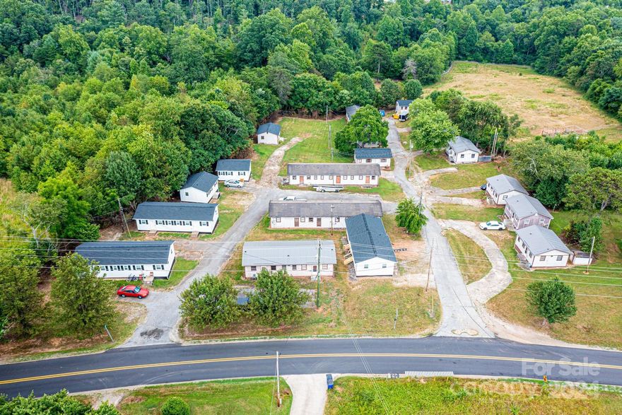 Introducing an exceptional investment opportunity with high revenue potential! 31 units total. This property features (1) 3-bedroom, 2-bathroom brick home along with (30) 2-bedroom, 1-bathroom apartment units. Eleven of these units have been completely remodeled to modern standards, and several others boast new roofs, ensuring minimal maintenance in the near future. Currently 20 units are rented. A few units need minimal work to get back in use. Situated on a sprawling 11-acre lot, approximately 8 acres are primed for additional expansion, offering vast possibilities for further development and increased rental income. This combination of established rental units and significant expansion potential makes this property a cash cow for savvy investors. Don’t miss out on this chance to maximize your return on investment!