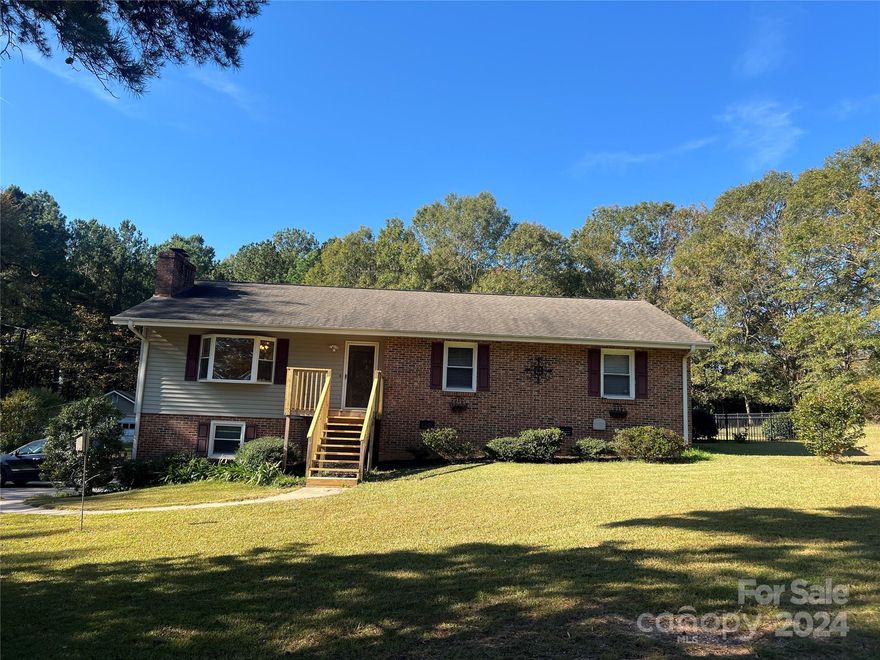 This well maintained home on 2 acres has a large eat in kitchen with granite countertops. 3 spacious bedrooms and 2 full baths on main level. An additional 1/2 bath on lower level includes the laundry room with a fire proof safe room, rec room and office. This property is a lifestyle home with a salt water pool and spa, covered screened in porch, additional garages for stoarge, chicken coop. The main garage/workshop has air conditioning, a car jack and separate room to relax.