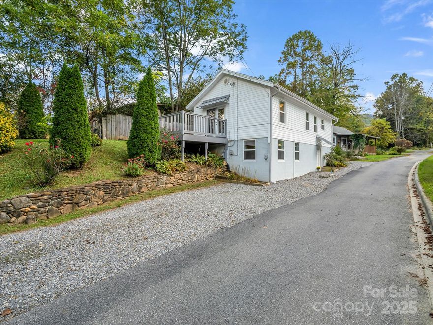 Nestled near the picturesque town of Black Mountain, this delightful 2-bedroom, 2-bath cottage offers the perfect blend of vintage character and modern comfort. Built in 1940 and thoughtfully maintained, this home is ready for you to move in and make your own. You'll love the warm, inviting atmosphere of this classic cottage, featuring hardwood floors, and cozy living spaces filled with natural light. The functional layout includes a comfortable living room, an efficient kitchen with granite countertops, a large deck and two spacious bedrooms-ideal for creating separate living spaces, a weekend retreat, or rental investment. Set on a peaceful, easy to maintain lot and just minutes from charming downtown shops, restaurants, and hiking trails, the property also boasts easy interstate access, making Asheville and surrounding areas just a short drive away. Whether you're looking for your first home, a mountain getaway, or a savvy investment in a sought-after location, this gem is a rare find!