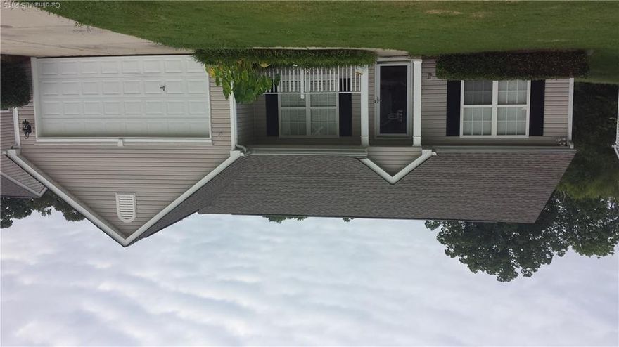 Half of the garage is still usable storage space. An opportunity to have a slice of paradise doesn't come along many times but it has for you today!! This freshly painted, three bedroom, two bath home features a bonus room, breezy covered rear patio, above ground pool, attached storage, detached storage, fenced yard and more.   The garage has been altered to create a bonus room. Half of the garage is still usable storage space. What a chance to relax at home!!!  Come see it today!