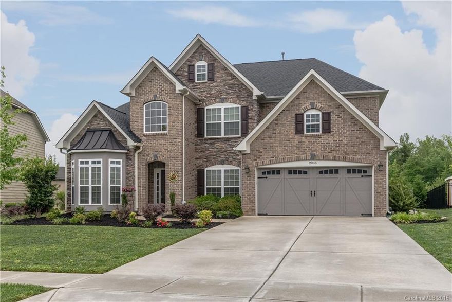 Great value in Indian Land!5BR/3.5BA, master, laundry, office on main, hardwoods in most of main living area, formal dining w/tray ceiling, 2 story foyer & great room, kitchen w/granite counters, tile back splash, under cabinet lighting, electric range(plumbed for gas), raised panel maple cabinetry, master offers sitting area, 2 walk in closets & vaulted ceiling, full irrigation (front, side, back, flower beds), extra outlets, new paint, new roof (2015).