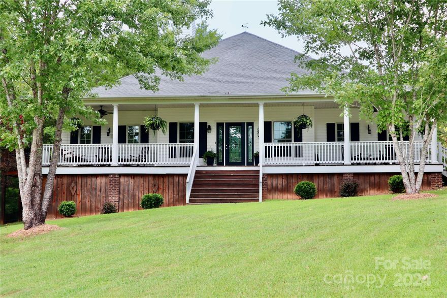 Welcome to your own private retreat as you drive down the tree lined drive leading to your rustic elegant home on 15+ acres overlooking the private fully stocked 1+/- acre pond. Large covered front porch leads to your covered back porch - perfect for entertaining. Beautiful, 3bdrm/2bath home offers you a spacious open floor plan with loft/sitting room overlooking the great room. Home & property have been meticulously maintained with an adorable, finished craft/shop with it's own HVAC that matches the home, a spacious 2 car detached garage w/loft area, provides sink, separate heat (propane) & AC along w/covered area for small equipment. The separate outdoor workshop provides water, heat & storage - perfect for those outdoor projects. Property is completely fenced, newly built bridges, wood walking path around the pond w/many beautiful places to stop & enjoy throughout. Separate fenced pasture w/pond fed water troughs for livestock & wide trails through woods. Add'l acreage available.