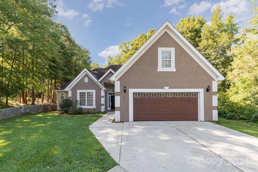 Discover the perfect blend of comfort and style in this Mint Hill gem! Enjoy an open, comfortable flow and floorplan with main level living, plus an oversized upstairs bedroom/bonus room with a huge walk-in closet. The spacious kitchen features upgraded cabinets, granite counters, and a tile backsplash, accented by beautiful archways throughout the main level. Soaring 12' ceilings grace the living and dining rooms, while the luxurious primary bathroom offers a serene retreat. Outdoor space includes a deck and private yard, perfect for entertaining. A circular driveway and 2-car attached garage add convenience. With neutral colors and move-in ready condition, this home is a must-see!