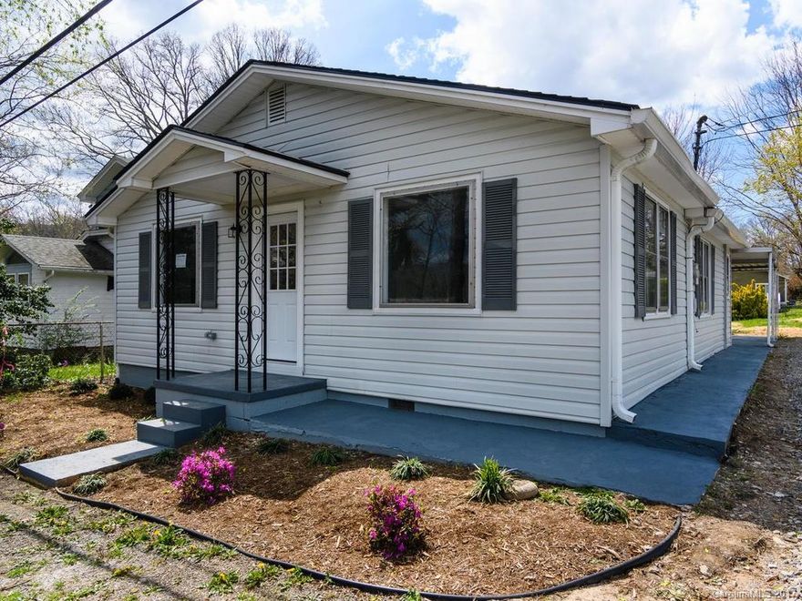 Fully remodeled bungalow on quiet neighborhood street within walking distance of Lake Tomahawk, tennis courts, & other amenities!  Front door opens to cozy family room w/wood stove & original hardwood floors. Open floor plan in dining/kitchen space with new granite, backsplash, stainless steal appliances, and breakfast bar.  Spacious Laundry/mudroom off kitchen leads to patio and large, flat backyard with mature trees. Home also has brand new roof, paint, H2O heater and newer HVAC