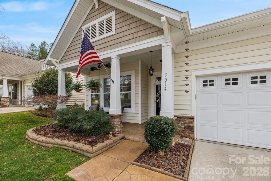 Prepare to be impressed as you enter this immaculately maintained home with thoughtful upgrades at every turn and added touches like the Japanese maple in the front yard and stamped concrete on the front porch!  When you walk through the front door, you’ll be wowed by the high ceilings, beautiful arches, custom accent wall, updated light fixtures, and rich hardwood floors throughout the main living areas. The beautifully updated kitchen features light, bright cabinets with both under- and over-cabinet lighting, subway tile backsplash, SS appliances and stunning quartz countertops & sink! The kitchen is open to the high-ceilinged living room, which boasts a stone fireplace with wood mantels that adds warmth and texture, and the large breakfast room with custom moldings. Rest and relax at the end of the day in the spacious main-floor primary suite, complete with a trey ceiling and bay window. The primary bath has updated ivory cabinets, and a deep tub & frameless glass shower, leading into an over-sized custom closet. The main floor layout is thoughtfully designed to include a secondary bedroom with full bath, home office or 3rd bedroom, and laundry room. The first floor windows have all been custom-tinted for energy efficiency.  Step through the French doors to enjoy a peaceful retreat on the screened porch with large sliding glass windows that can make it a 4-season room.  The back yard features a stamped concrete patio with a custom-made brown cedar pergola, tea olive trees, the calming trickle of a fountain, and fully fenced yard surrounded by fragrant jasmine for enhanced privacy. Upstairs you’ll find a large bonus room that could be a 4th bedroom with a full bath, walk-in closet and extra storage.  Enjoy your favorite movies with surround sound!  Additional features of this home include pull-out drawers in the kitchen and primary bath cabinets, as well as the pantry; a whole-house UV air purification system; central vacuum; widened driveway for ease of parking; irrigation system; natural gas line for your grill; and the entire house is carpet-free except for the stairway. The HOA dues even include lawn care and trash removal, making this home low-maintenance. Cobblestone is a "hidden gem" in Indian Land.  It's a friendly community with sidewalks and tree-lined streets, where residents enjoy the community pool with cabana, clubhouse, and picnic area. Cobblestone is conveniently located near the new Costco and Target, nearby shopping at Hobby Lobby and other stores, several grocery stores, the YMCA and other fitness facilities, tons of restaurants, as well as health care and banks. Convenient to Charlotte with low SC taxes!  Showings to begin on 3/5/26!