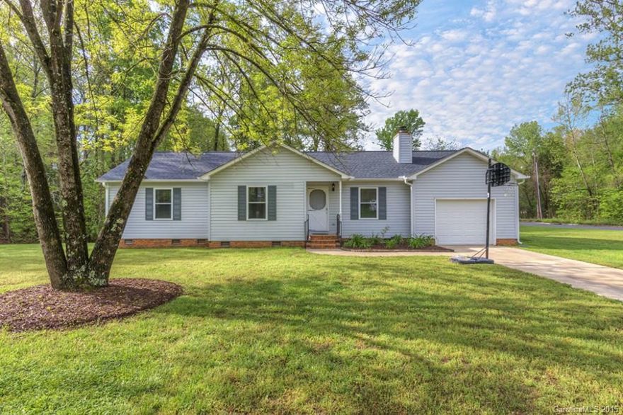 Location, Location, Location!!! Minutes from I77, shopping and schools!  Well taken care of home sitting on two lots!  Home features granite counter tops in the kitchen, large laundry/mud room, 1 car garage, screened porch, and stone fireplace.New roof in 2013 This is an amazing home with features that you will not find in this price point! Buyer/Agent to verify all pertinent info necessary in the decision making process; i.e., SqFt, zoning, schools, age, lot size, etc.(age of home is estimated)